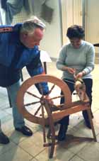 Visitors with spinning-wheel
